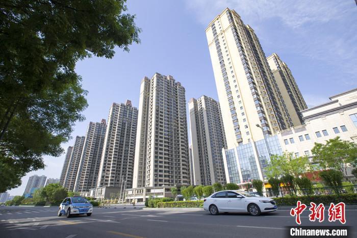 資料圖：車輛從一樓盤前經過。 <a target='_blank' href='/'><p  align=